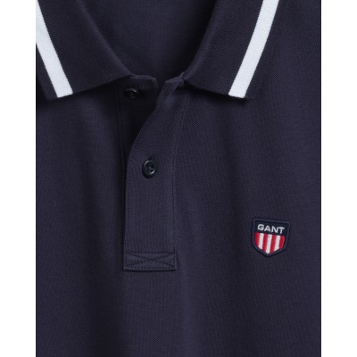 POLO EM PIQUÉ COM LOGOTIPO RETRO SHIELD